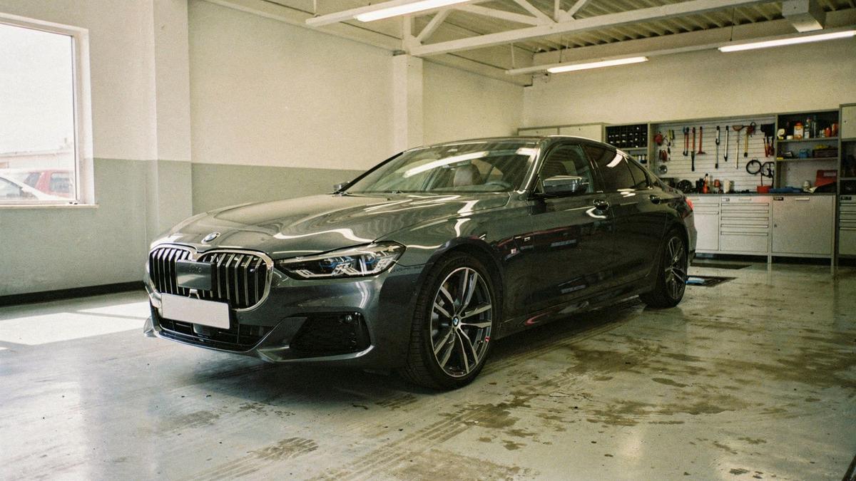 Sample dossier vehicle standing in a dealership bay in Kyiv